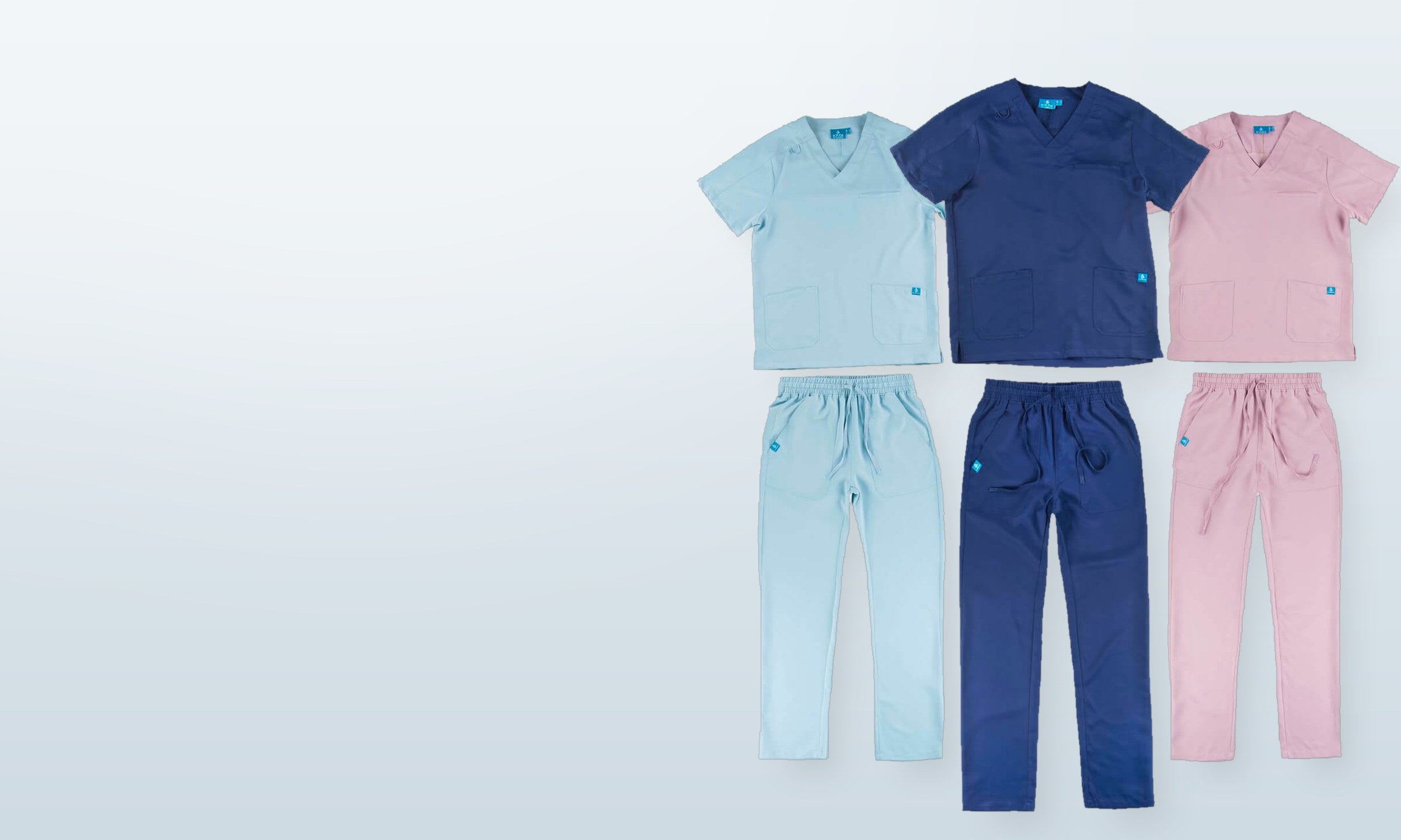 Set sanitario casacca e pantalone in microfibra, nei colori azzurro, blu navy e rosa